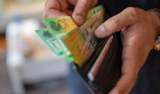 Úc: Việc thanh toán lương bằng tiền mặt sẽ không được khấu trừ thuế